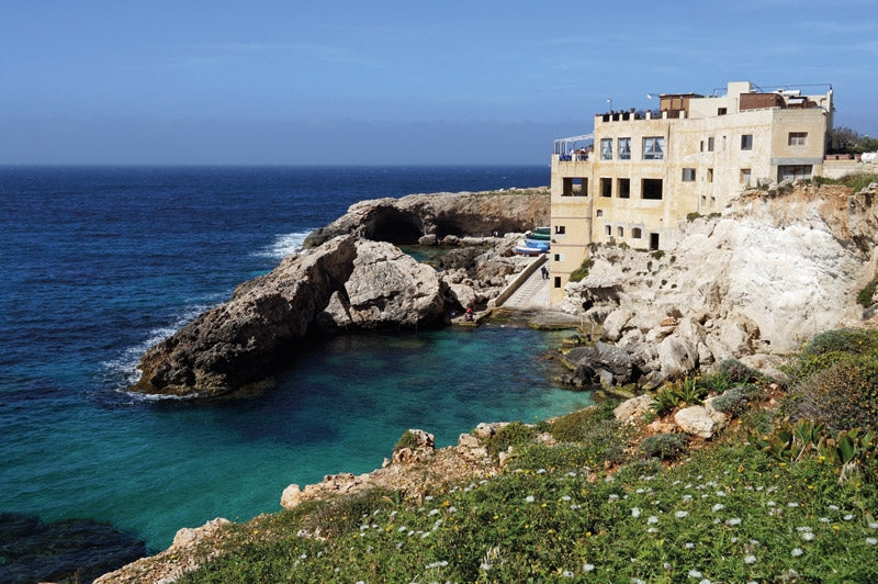 Walking on Malta - Route Photos - Ghar Lapsi is a huddle of buildings above a small rocky cove