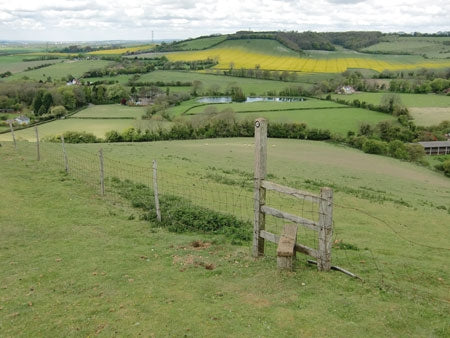 The North Downs Way - Route Photos - Cobbs Hill gives a view down to Water Farm and Stowting (Stage 10)