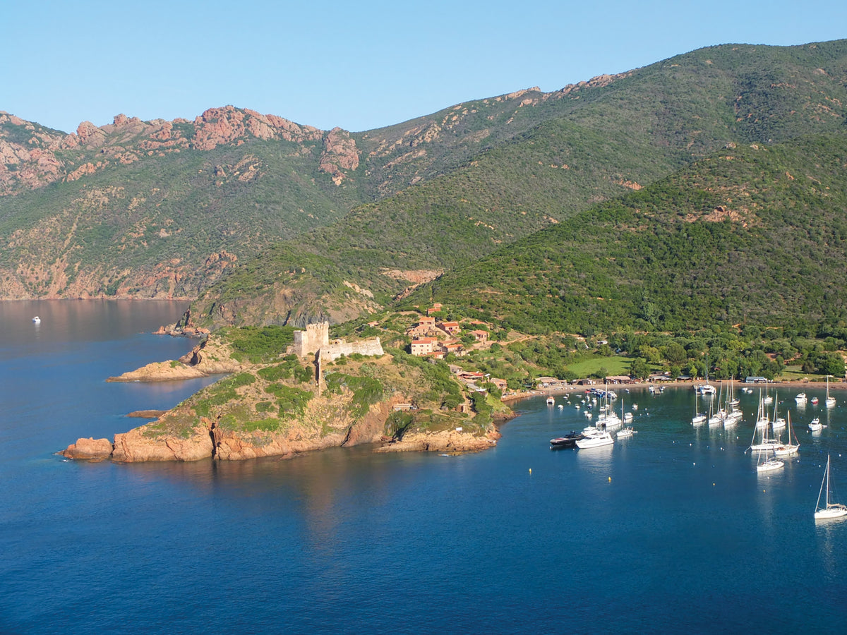 Walking on Corsica - Route Photos - Girolata lies in a beautiful bay backed by the Scandola promontory (Walk 5)