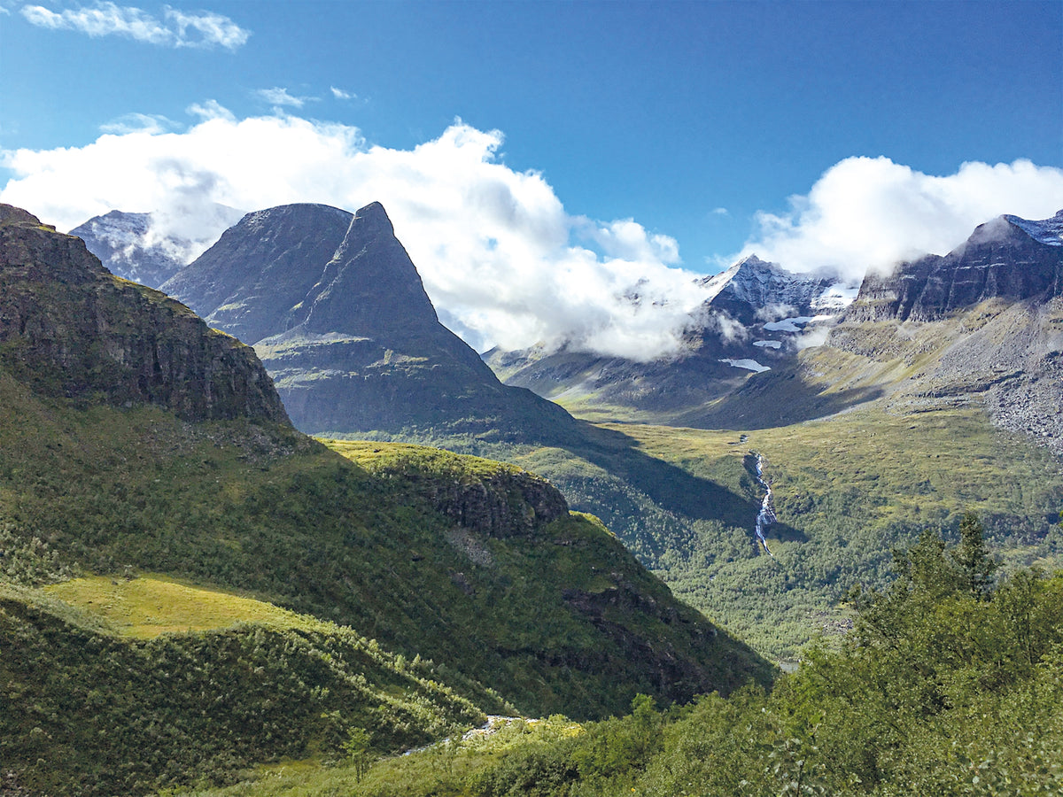 Hiking in Norway - South - Route Photos - Innerdalstårnet towers above the Innerdalen valley; the waterfall drains Storvatnet lake