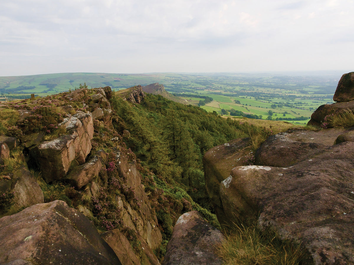 Walking in the Peak District - White Peak West - Route Photos - Looking down the length of the Roaches to Hen Cloud and beyond to the plains of central England (Walk 21)