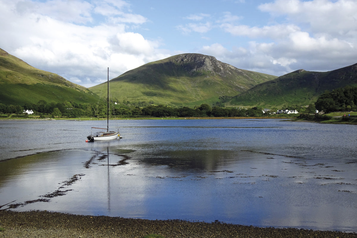 Walking on Arran - Route Photos - The view inland at high water from Lochranza Castle across the sea loch at Lochranza (Walk 26)