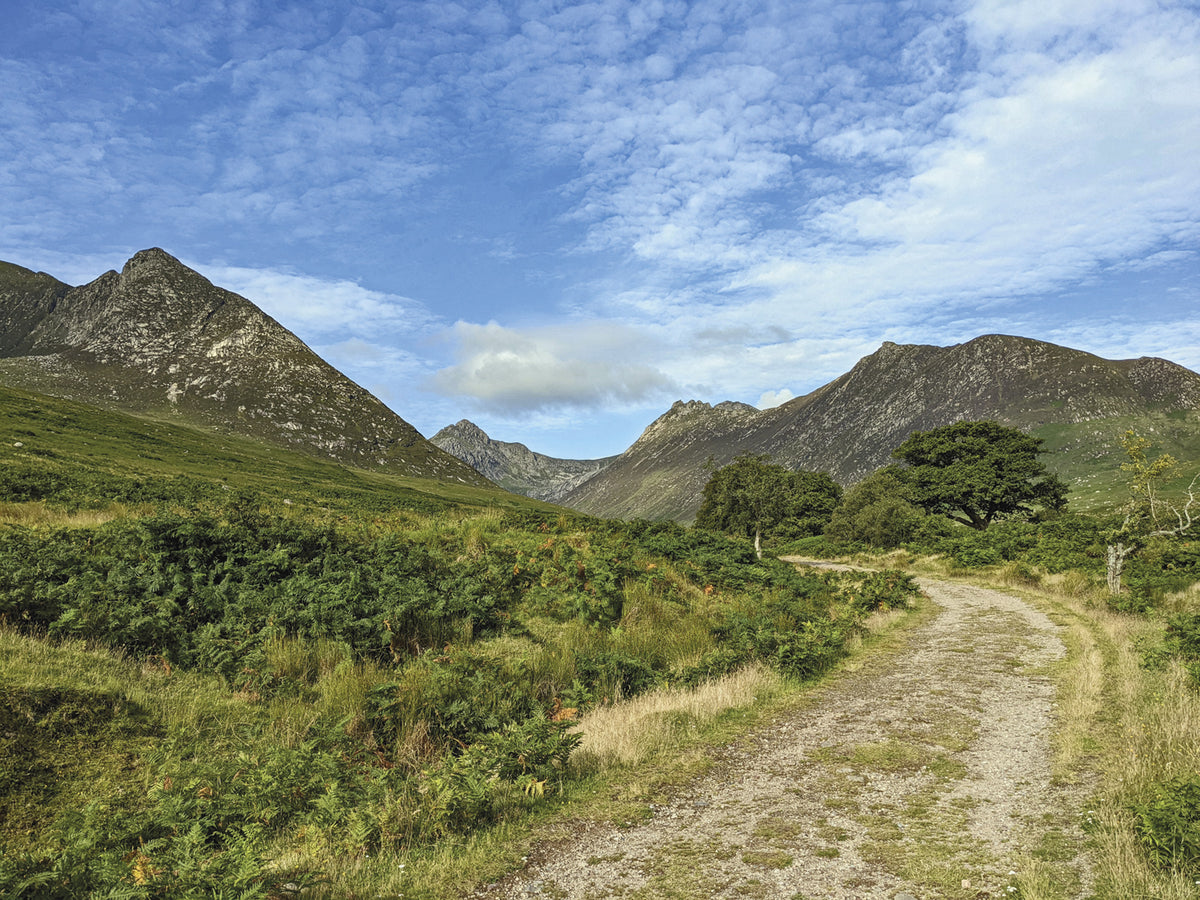 Walking on Arran - Route Photos - A clear track runs towards the mountains, but the high summits involve hands-on scrambling at times (Walk 30)