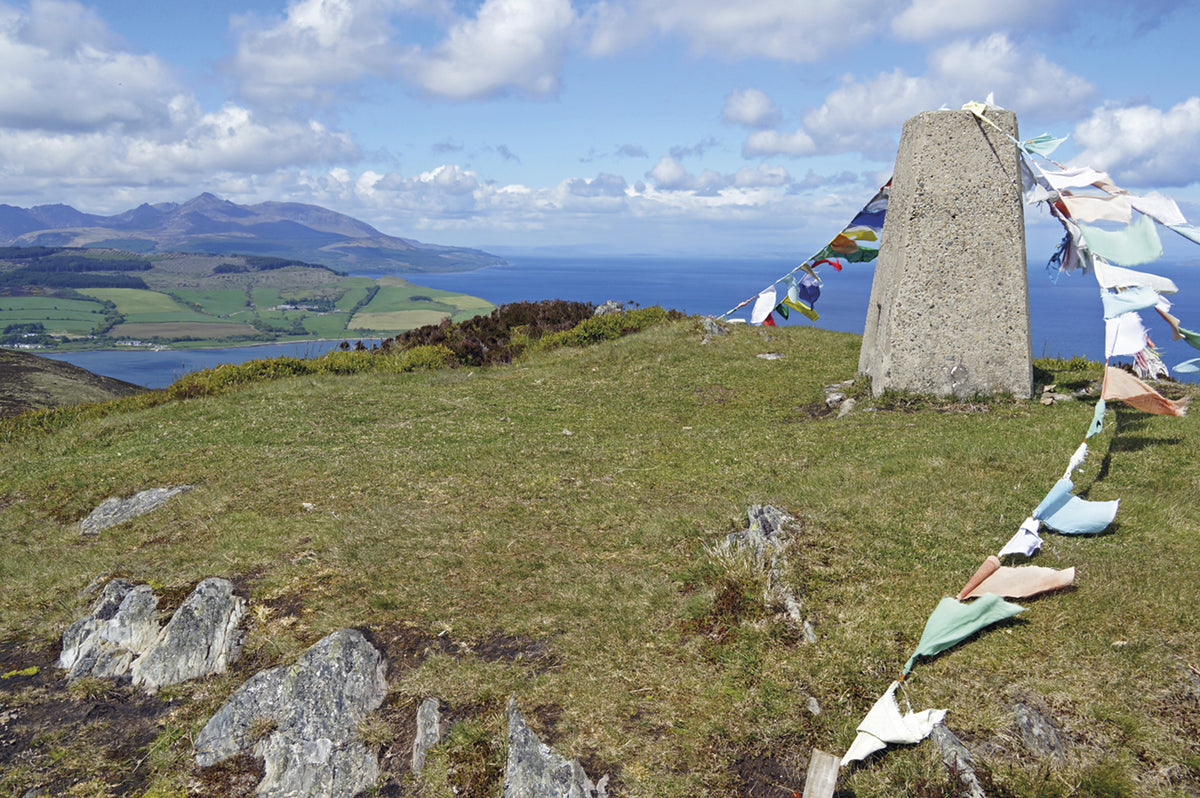 Walking on Arran - Route Photos - Prayer flags catch the breeze on the summit of Mullach Mòr (Walk 6)
