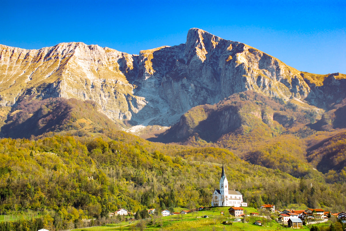 Walking the Julian Alps of Slovenia - Route Photos - The village and church of Drežnica delow Krn