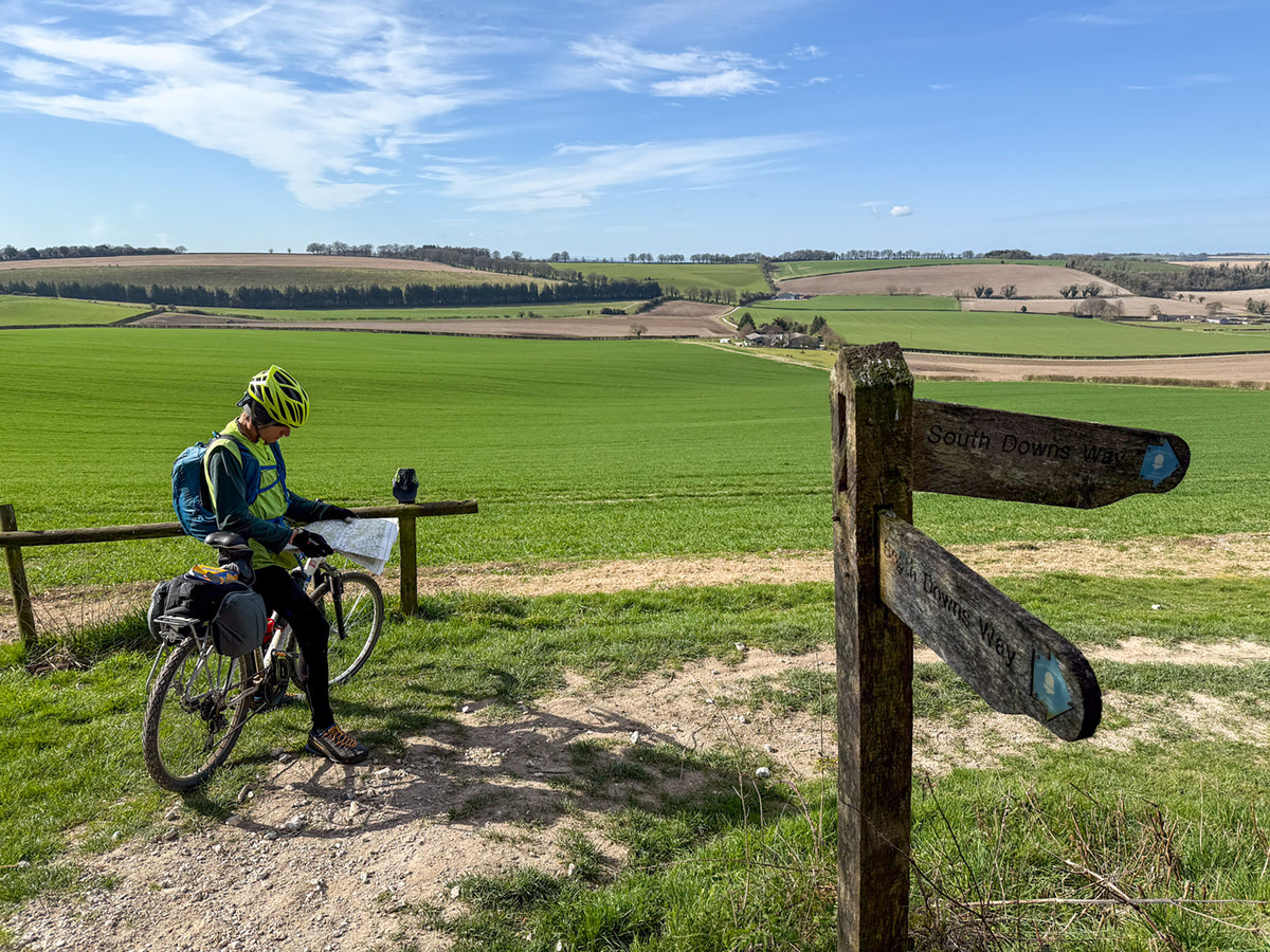 Bikepacking King Alfred's Way - Route Photos - Checking the map at the foot of Winchester Hill