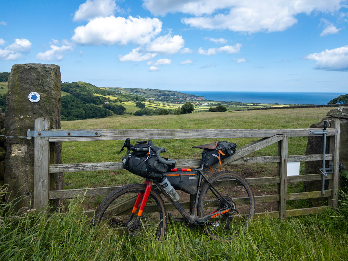 Bikepacking in the Yorkshire Dales and North York Moors - Route Photos - The view back towards Robin Hood Bay after climbing onto Swallow Head