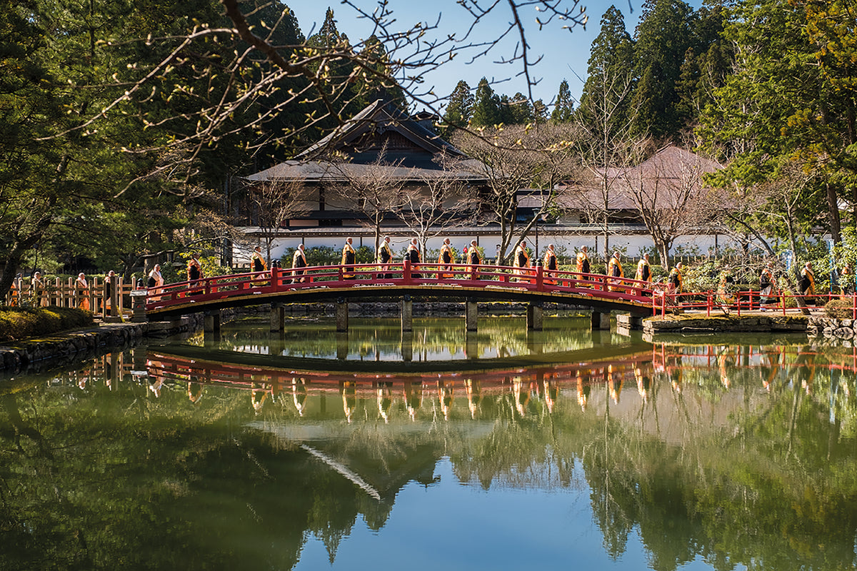 Japan's Kumano Kodo Pilgrimage - Route Photos - Buddhist priests crossing a bridge over the Hasu-ike (lotus pond) in Koyasan during a spring festival