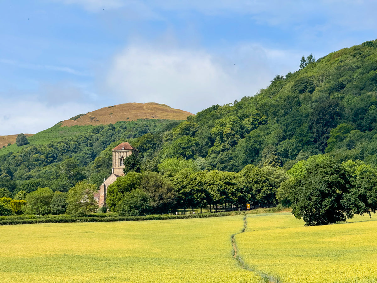 Walking in Worcestershire - Route Photos - Looking back towards Little Malvern Priory and British Camp hill fort