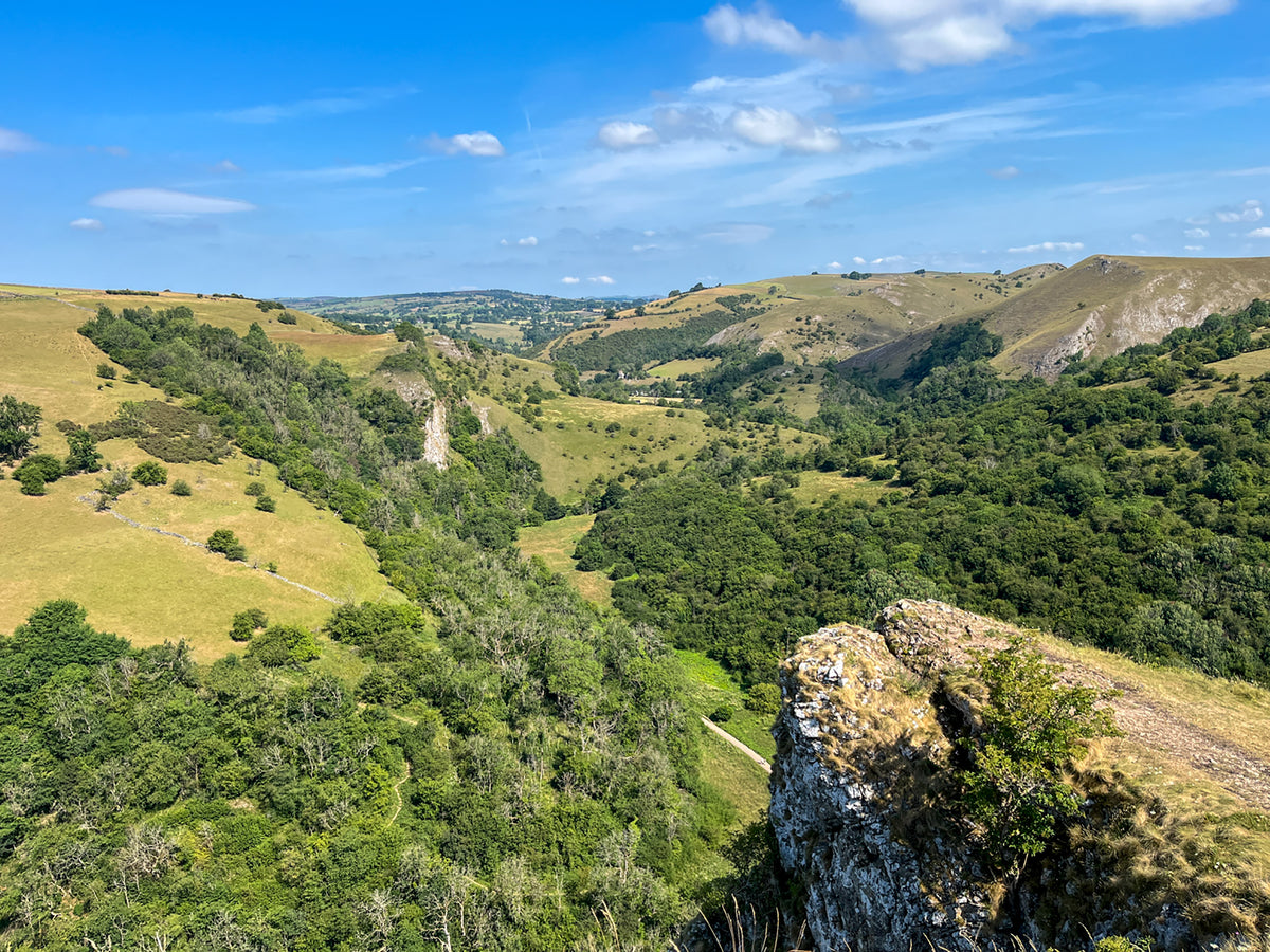 15 Short Walks in the Peak District - Buxton, Dove Dale and the South West Peak - Route Photos - A view of the Manifold valley from above Thor’s Cave