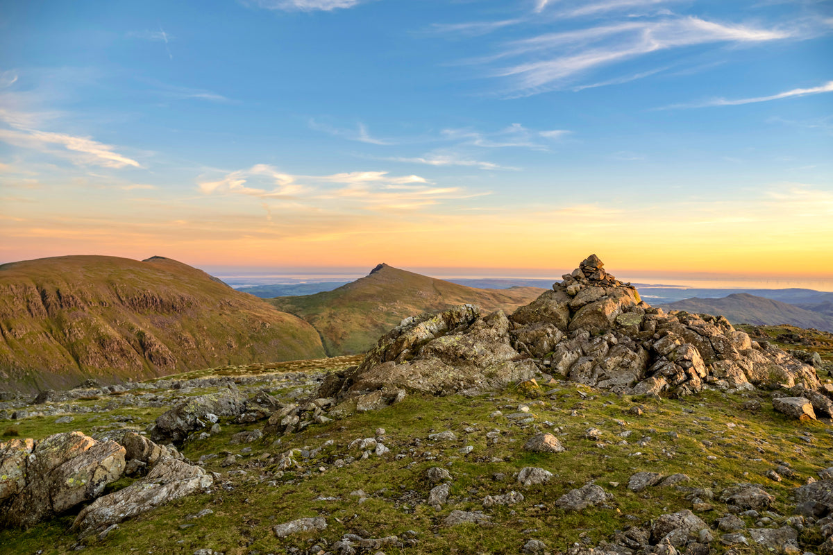 Best Walks in the Lake District - Route Photos - The summit of Grey Friar at sunset, looking back to the summits of Brown Pike, Dow Crag, Coniston Old Man, and Brim Fell