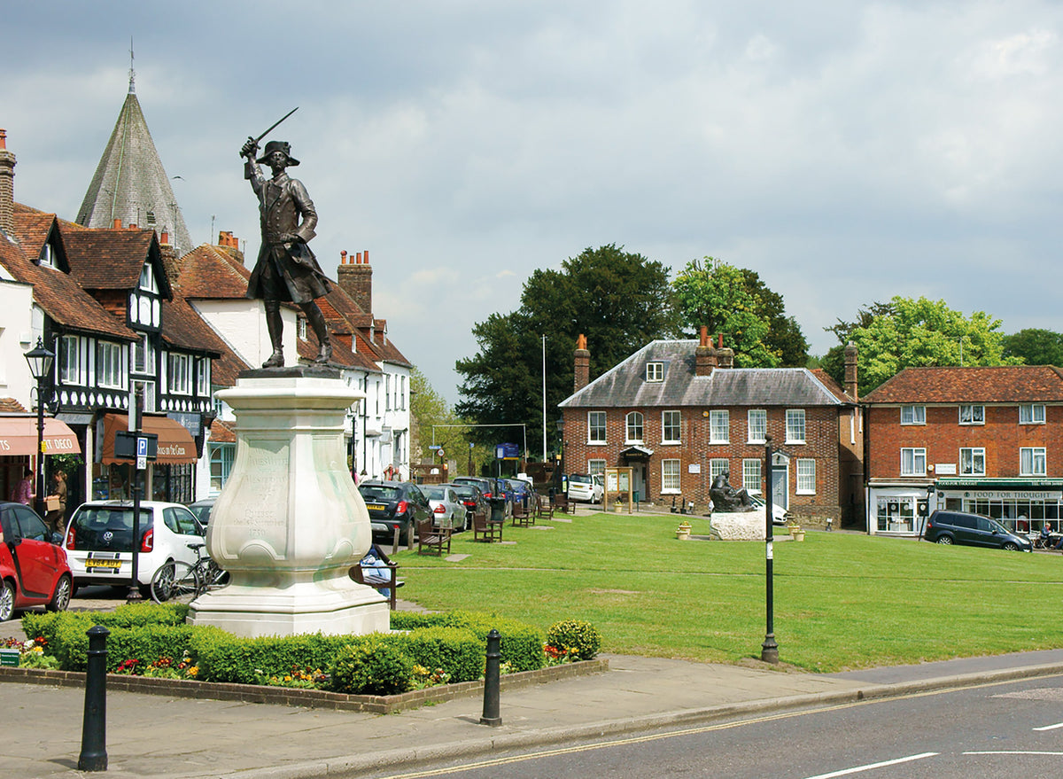 Walking in Kent - Route Photos - In the heart of Westerham James Wolfe holds his sword aloft, while behind him Churchill stares glumly from his seat on the green (Walk 3)