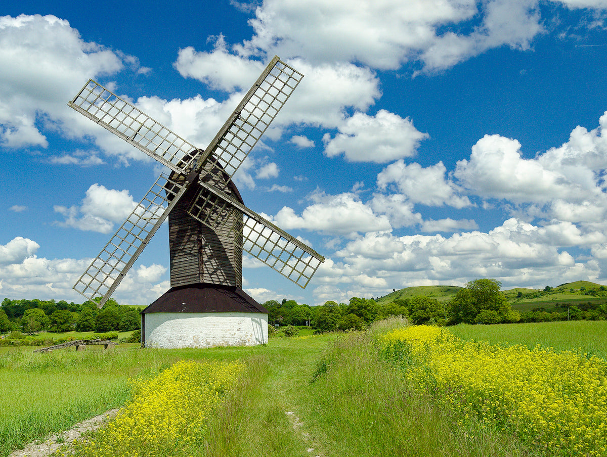 The Ridgeway National Trail - Route Photos - The early 17th century Pitstone Windmill with the Ivinghoe Hills in the background