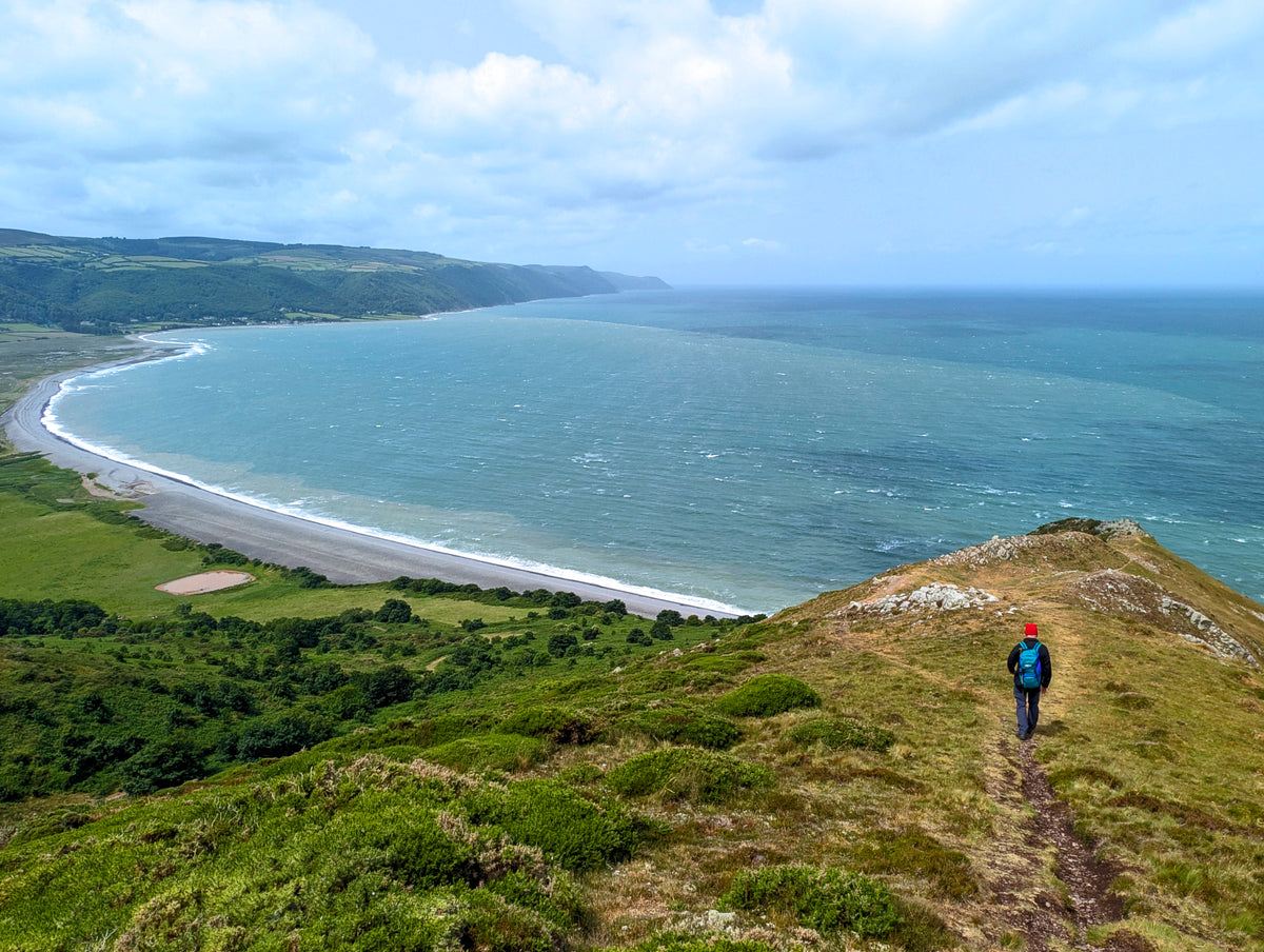 Walking the South West Coast Path - Route Photos - A narrow path descends and takes a convoluted course around the rugged Hurlstone Point